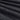 Black sunshade material with fine woven texture, close-up view of layered fabric