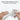 White silicone dual cup holder insert held in hands, molded two-well tray