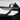 Dark Alcantara door panel trim insert with red ambient accent line near the door handle area.