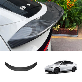 V-style carbon fiber rear spoiler with dark carbon-weave lip, mounted on white car