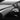 Alcantara dashboard overlay cover with dark textured surface on car trim