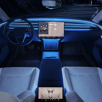 Car interior ambient LED light kit with blue light bars along dashboard and console