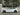 Wheel covers on a white sedan, dark multi-spoke rims with tires