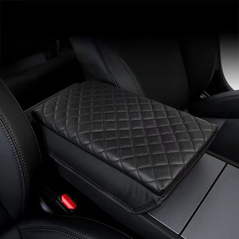 Armrest cover cushion on center console, dark quilted diamond pattern