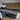 Real Carbon Fiber Front Armrest Cover installed on 2024+ Model 3 Highland