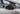 Rear mirror cap with carbon-fiber texture, dark gray triangular housing on truck door