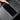 Gray console organizer tray with open compartments and phone holder divider