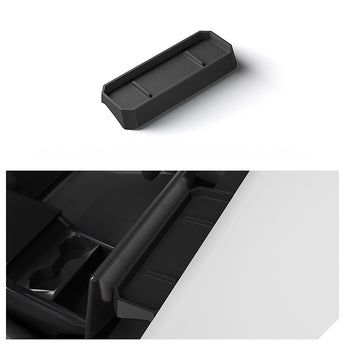 Dark gray/black hidden storage tray organizer insert, installed in the center console