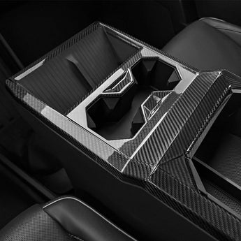 Carbon fiber center console panel cover with geometric cutouts and chrome trim