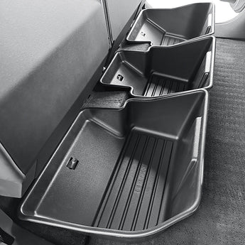 Underseat storage bin with multiple compartments and ribbed insert, dark gray.