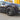 Cyclone-style hubcap on a Tesla wheel, dark spokes and center cap detail