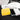 Leather seat cleaner kit with bottle, yellow sponge, and foam pads on seat