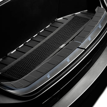 Front trunk sill plate protector installed with textured center strip and arrow markers