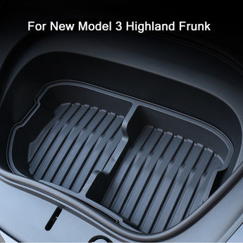 Front trunk storage tray with raised ridges and molded channels for items
