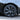 Dark wheel cover with multi-spoke pattern and visible Michelin tire lettering