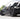 Black mud flap set installed on front wheels of a Tesla sedan