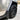 Gray rear mud flap mounted beside black tire on Cybertruck