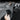 Black TPE mud flap held by hand, flexible material with mounting hole