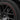Black 18-inch wheel cover with red rim stripe and plain center hub