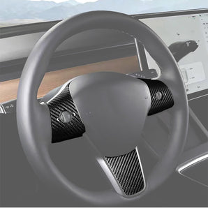 Carbon fiber steering wheel wrap installed on steering wheel spoke and center