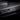 Carbon fiber door sill cover strip with black weave texture and center mounting notch