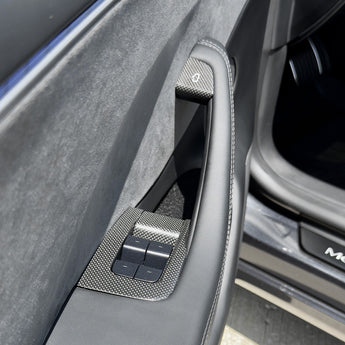 Carbon fiber window switch trim cover with embedded switches on a door armrest
