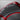 Rear trunk lid cover mat with molded recesses and ribbed grooves, dark gray