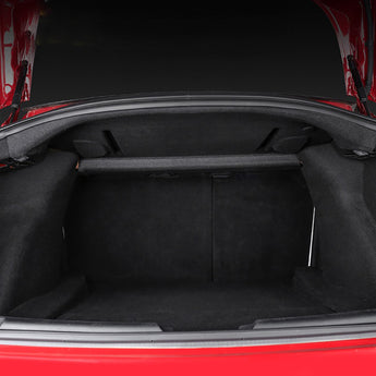 Installed black rear trunk soundproof mat covering the cargo floor and walls