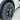 Wheel rim protector close-up on tire sidewall and alloy wheel edge