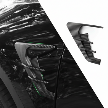 Camera trim cover with carbon-fiber texture and green accent, close-up on door panel
