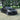 Front lip spoiler kit for Tesla Model 3 installed on black sedan—front bumper lip