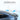 Rear spoiler on dark blue car trunk, glossy black curved lip with side fins
