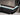 Stainless steel rear bumper guard with illuminated edge LED accent