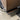 Stainless steel rear bumper guard with side step trim and curved lower lip