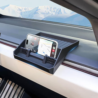 Tesla Cybertruck phone holder tray holding a smartphone on the car dashboard
