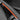 Orange Alcantara door handle wrap strip on gray interior door handle base