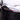 Front headlight trim film outlining the lens with a red accent strip