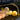 Warm gold trunk LED light strip border with mixed balloons in Model 3 trunk