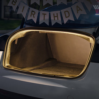 Warm white trunk LED light strip outlining the Model 3 trunk opening
