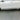Carbon fiber side skirt trim for Tesla Model Y, shown installed on the lower door