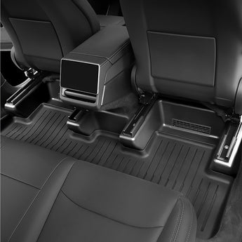 Black TPE seat slide rail protector on front passenger floor near seat