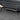 Rear bumper diffuser piece with three fins and glossy silver edge