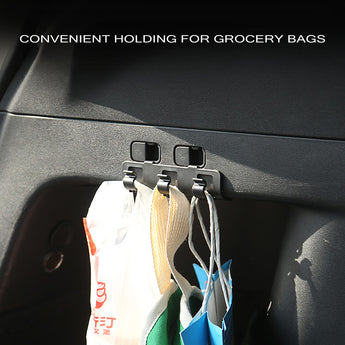 Car trunk grocery bag hooks with four clips holding hanging shopping bags