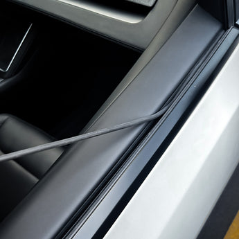 Installed black rubber window seal along the car door opening under the window frame.