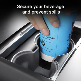 Black cup holder insert holding a drink cup in the center console slot