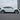 Tesla Model Y wheel protector on both wheels, with black curb guards visible