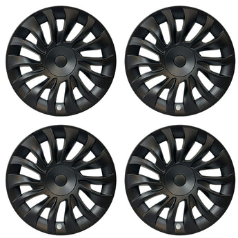 Four black multi-spoke wheel covers with circular center caps and small silver spoke accents.