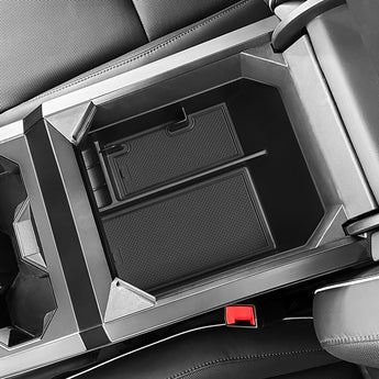 Armrest storage box for Tesla Cybertruck with textured top tray and lower storage compartment