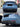Carbon fiber rear diffuser installed on a blue car with dark center fins