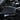 Tesla side mirror cover in solid dark black with smooth glossy surface